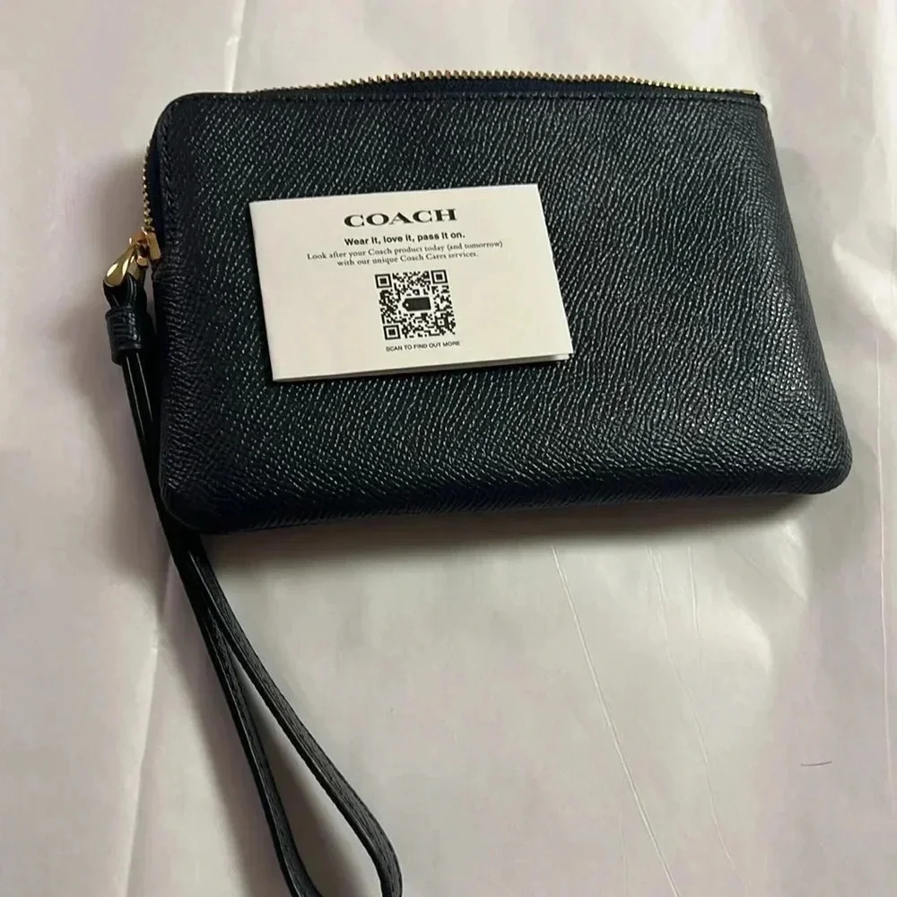NWT Coach cross grain leather corner zip wristlet.